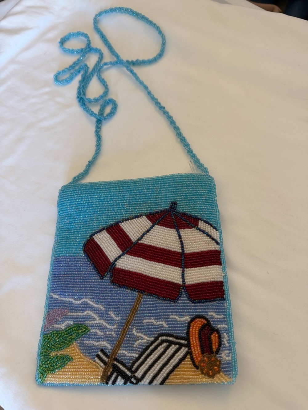 Beaded Beach Scene Crossbody Bag with Red-White Umbrella